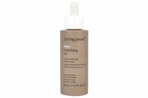 Flaska med Living Proof Frizz Vanishing Oil, en lätt olja i håret som motverkar friss och ger glans.
