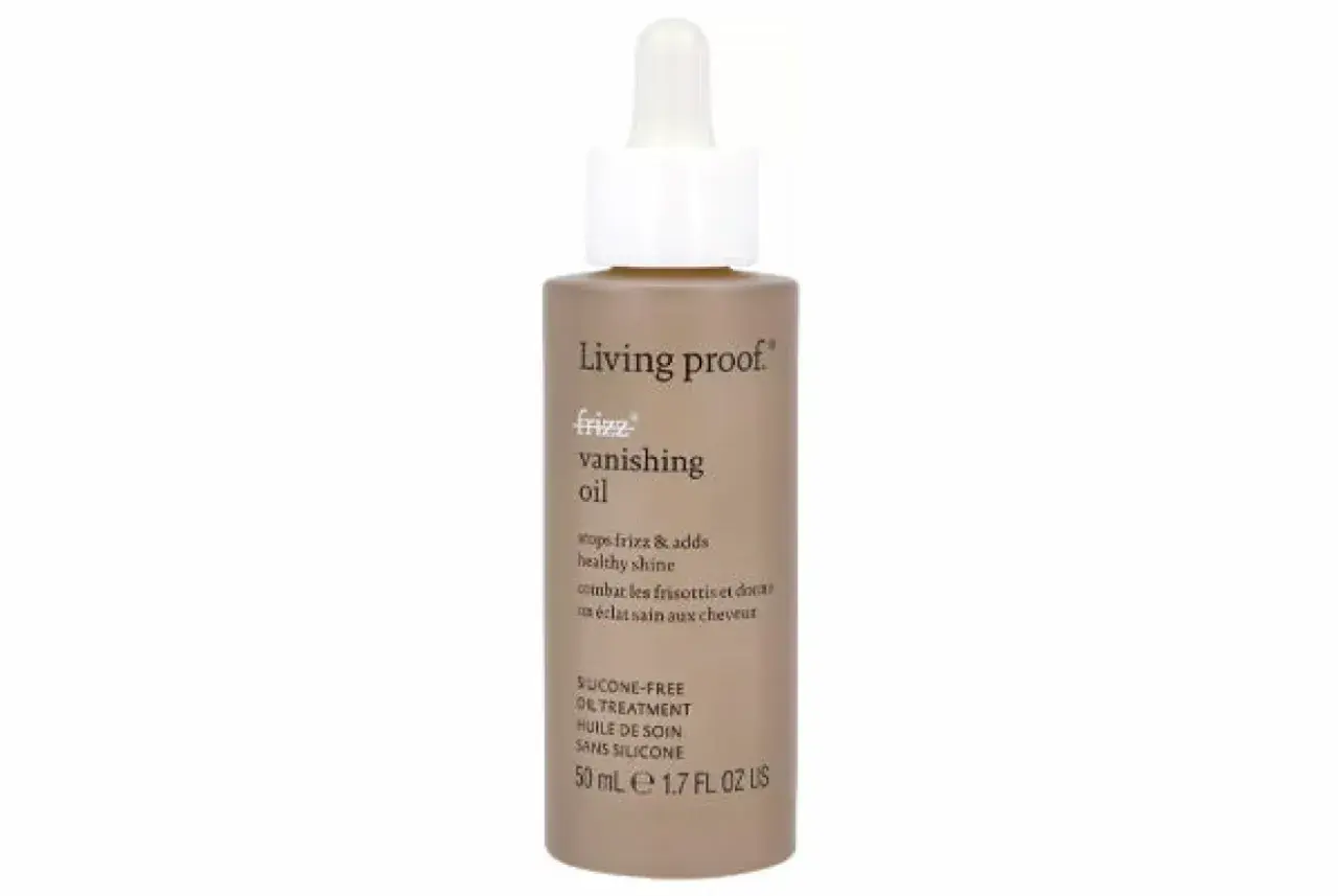 Flaska med Living Proof Frizz Vanishing Oil, en lätt olja i håret som motverkar friss och ger glans.