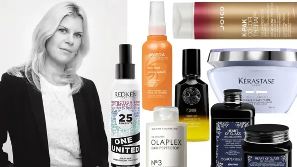 Kvinna med naturligt blont hår omgiven av lyxiga hårvårdsprodukter från märken som Kérastase, Oribe och Aveda.